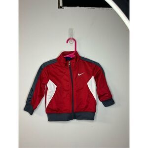 Red and white children’s Nike jacket size 12 month